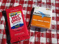 A 5-pack of Action Wipes vs. a 15-pack of baby wipes