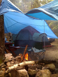 Tarps provide additional family camping shelter