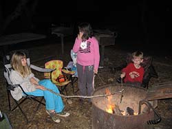 Keeping the kids busy with a campfire while I setup camp