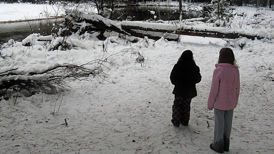 Exploring around the Merced River in Yosemite Village. Can you tell which girl refused snow pants?