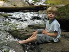 Playing in a mountain stream