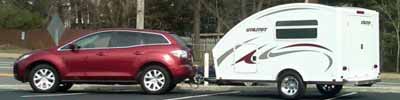 Part camper and part toy hauler - the Utilitoy is a flexible trailer that is great for families